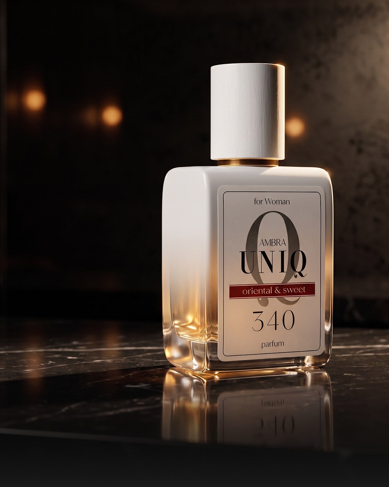 340. Perfumy Ambra UNIQ na czarnym marmurze, nocą
